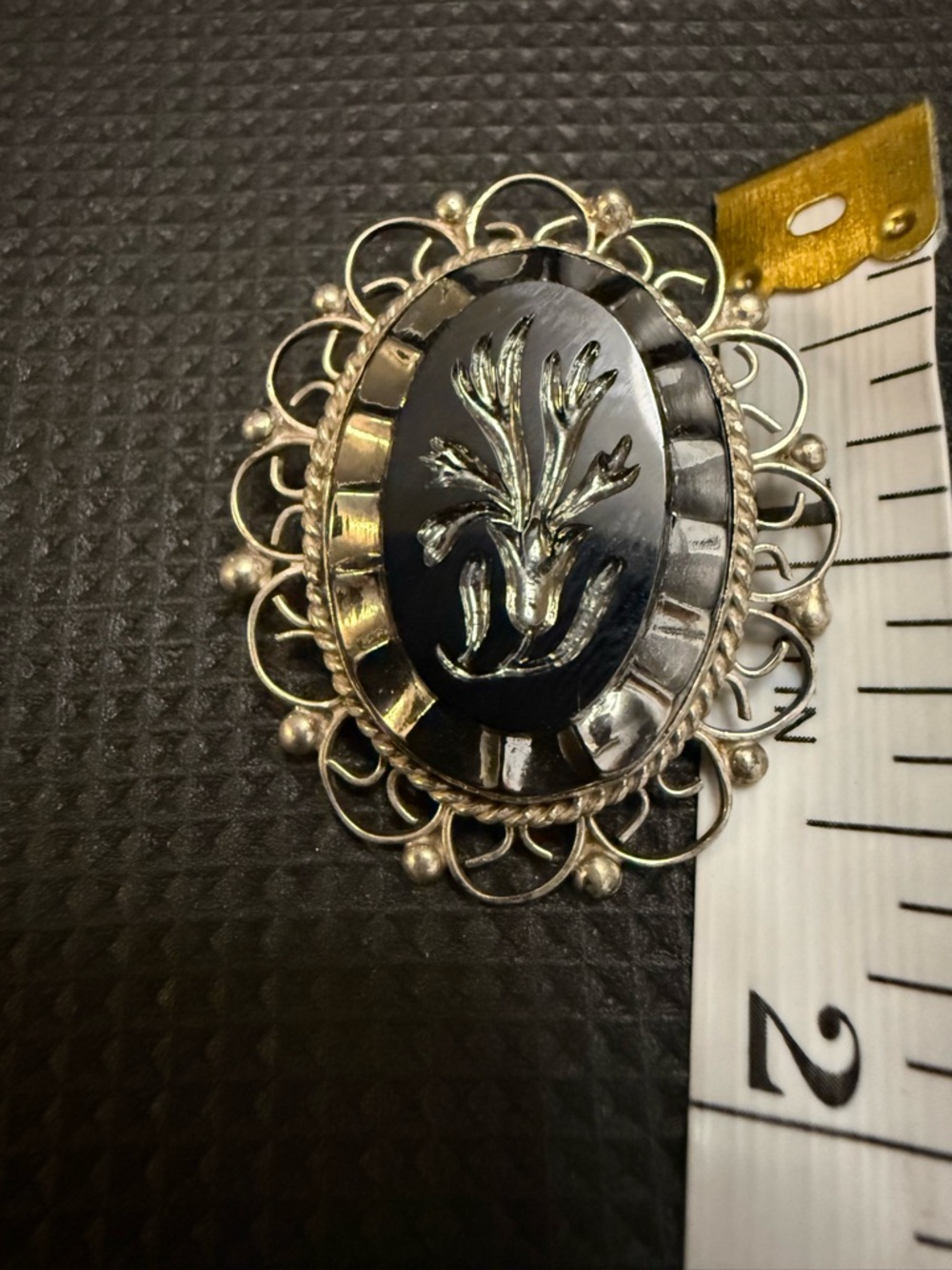 Vintage Black Glass Floral Cameo Brooch with Filigree Frame